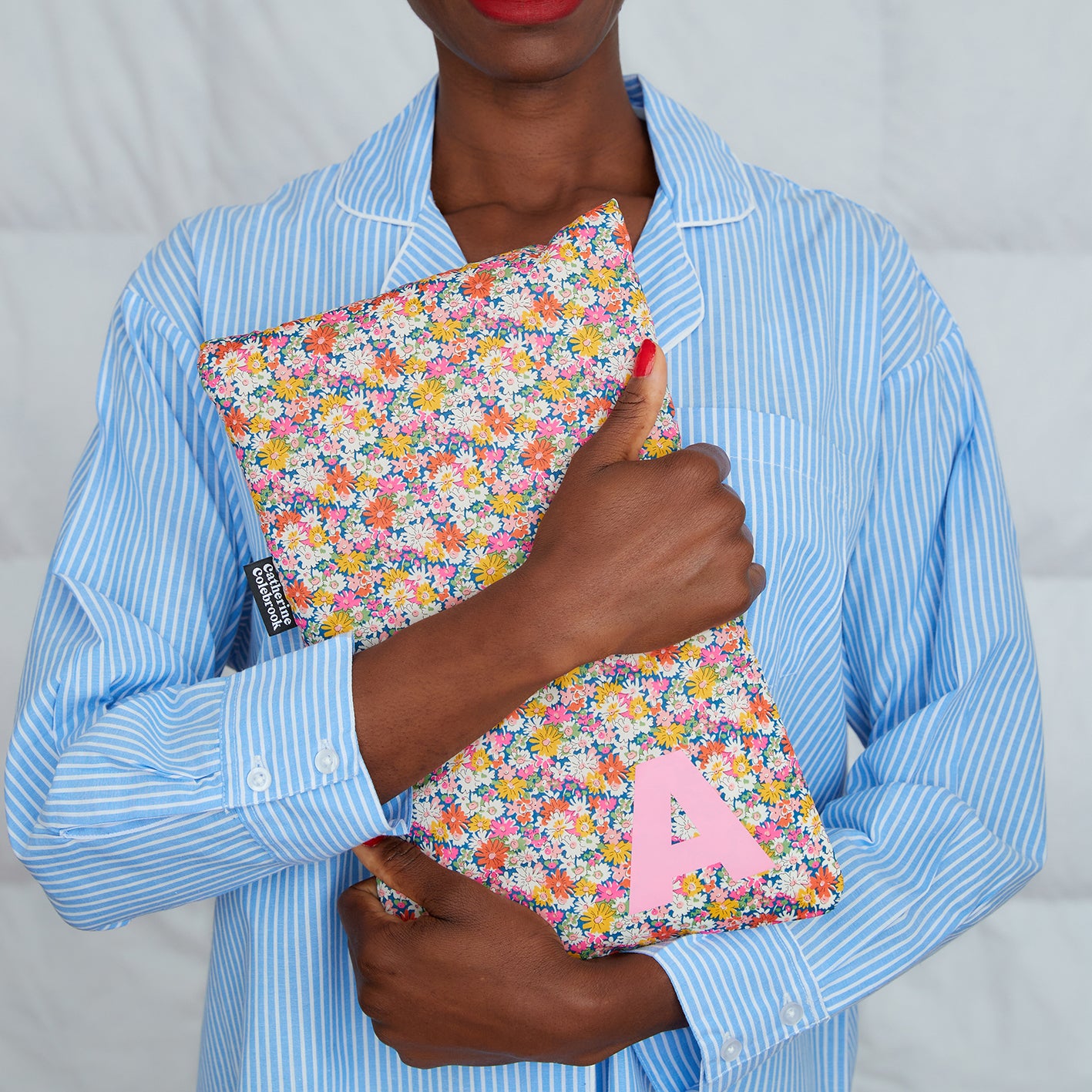 LIBERTY INITIAL HOT WATER BOTTLE PINK/YELLOW Catherine Colebrook