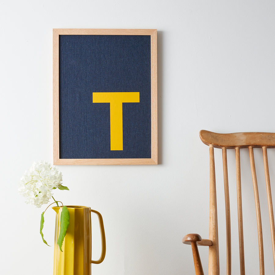 Catherine Colebrook framed denim initial picture, in denim with yellow letter, in an oak frame