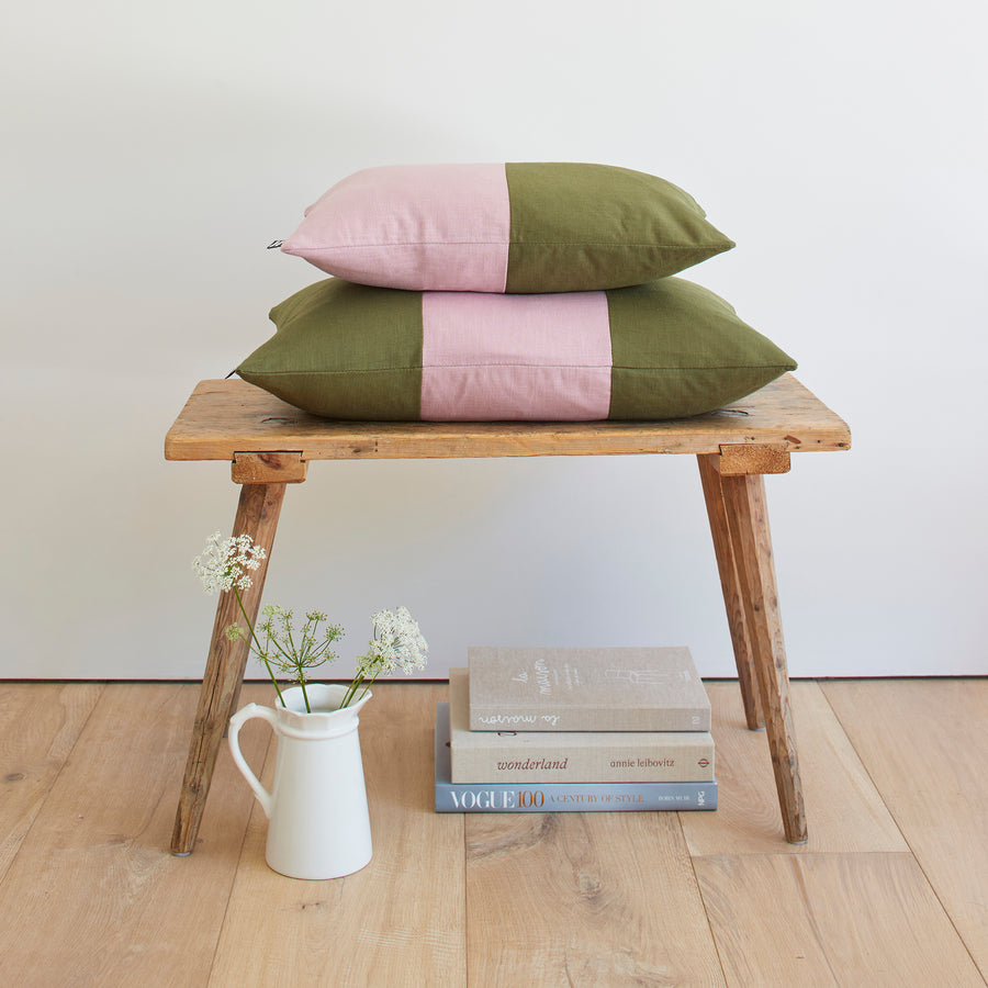 CATHERINE COLEBROOK TRIPLE COLOUR BLOCK CUSHION IN DUSKY PINK JUNGLE ON A BENCH