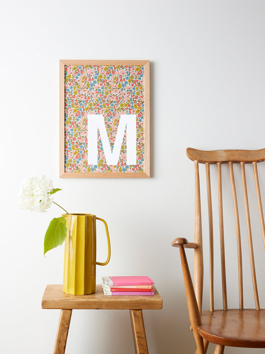 Catherine Colebrook framed Liberty initial picture, in Poppy & Daisy fabric with white letter, in an oak frame