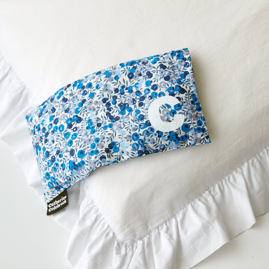 Catherine Colebrook blue Liberty eye pillow with white initial on the bottom right with optional lavender